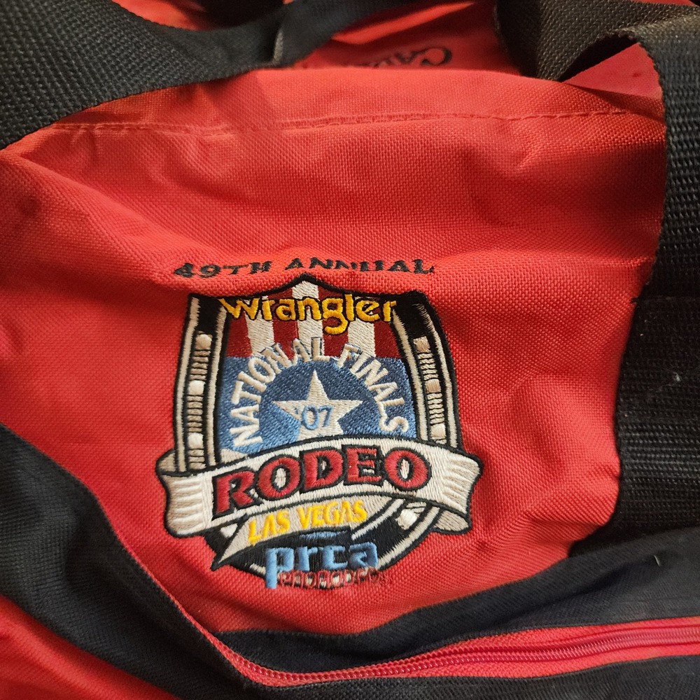 Wrangler National Finals Rodeo 2007 Justin Boots Cavenders Duffle Bag Red Black